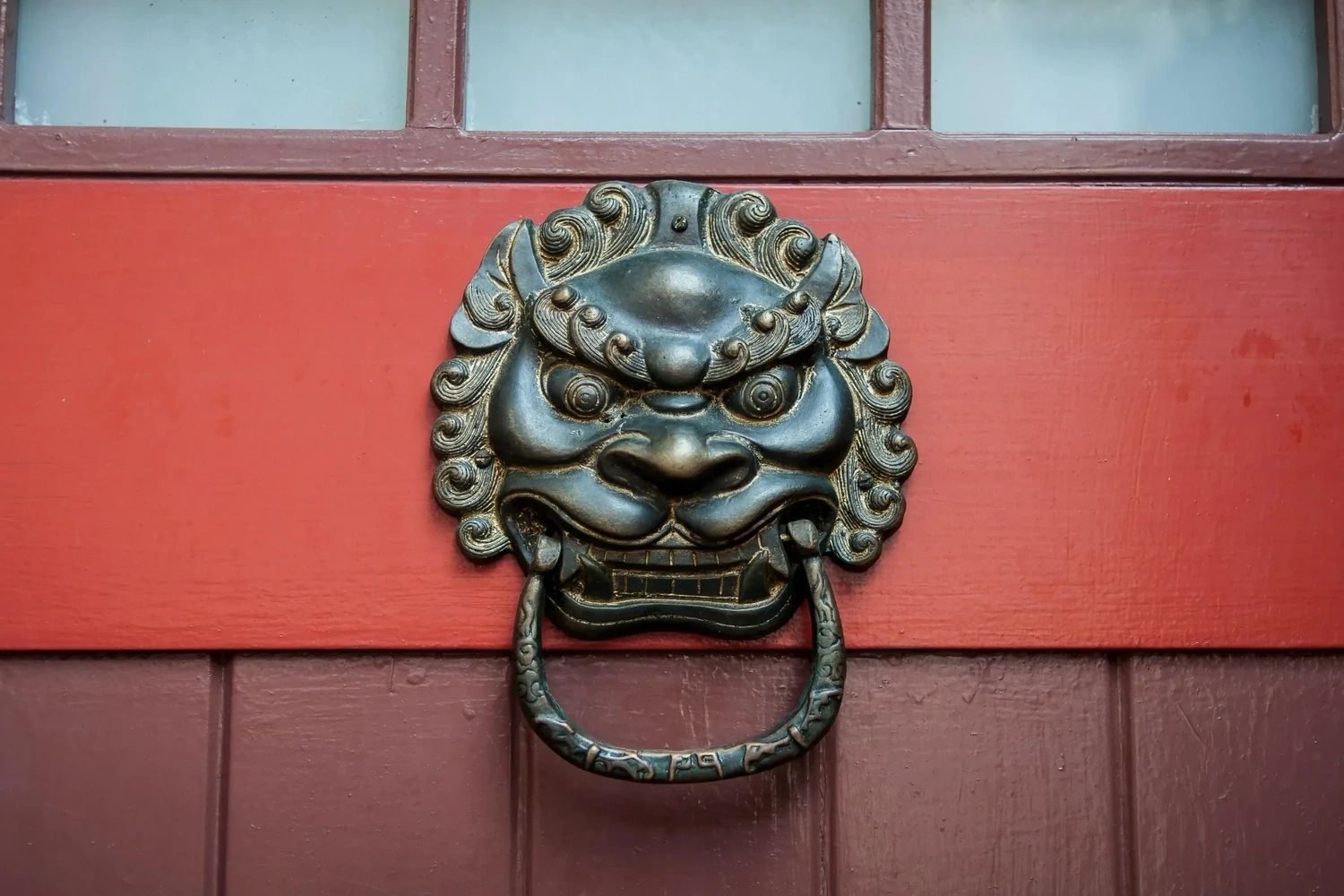 Pre-enforcement asset check Dragon face door knocker to show the Pre-enforcement asset check service